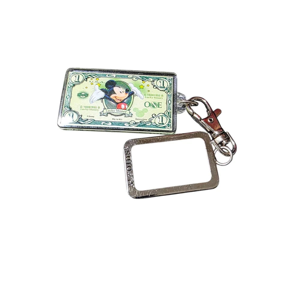 Silver Keychain with Cartoon Design